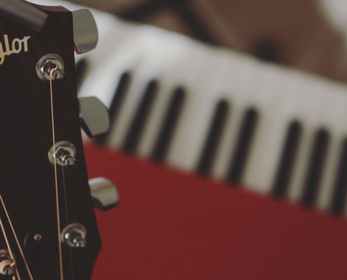 Taylor Guitar and Nord Keyboard